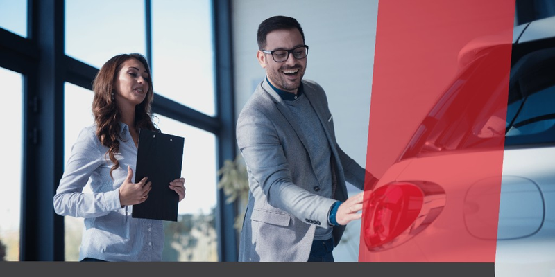 Corporate professionals reviewing a fleet vehicle with MYLEASE